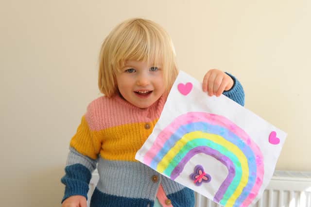 Children having been creating rainbow pictures across the UK and putting them in their windows, to help cheer up their community and spread some happiness whilst the Coronavirus pandemic continues. Pictured is: Erin Woodford, two, from Swanmore.
Picture: Sarah Standing (230330-7368)