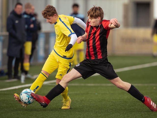 Action from the U16 GEC Marconi Invitation Cup final between Horndean Hawks Condors (red/black) and Pickwick Youth Panthers (yellow). Picture: Keith Woodland (260221-689)