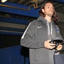 Pompey defender Christian Burgess is suspended for the trip to Peterborough