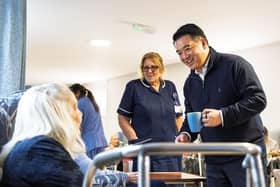 Alan Mak MP talks to a resident at Cross Way House Care Home in Havant
