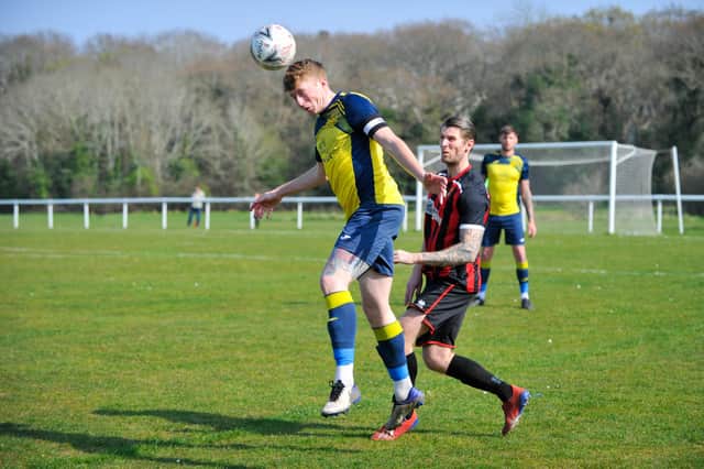 Moneyfields' Liam Kyle wins this header at Fleetlands. Picture by Dave Bodymore