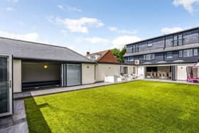 This beautiful home in Havant Road, Drayton, comes with a bar at the end of the garden.