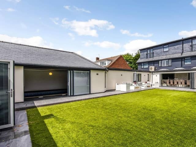 This beautiful home in Havant Road, Drayton, comes with a bar at the end of the garden.