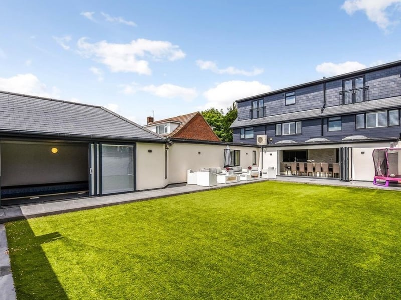 This beautiful home in Havant Road, Drayton, comes with a bar at the end of the garden.
