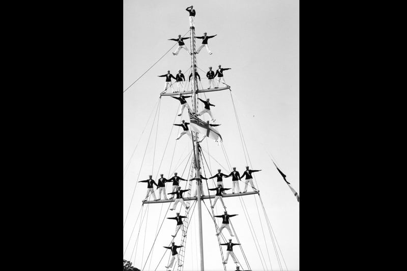 The manning of the mast is performed at the field gun centre at HMS Excellent in July 1994. The News PP4965