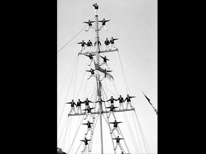 The manning of the mast is performed at the field gun centre at HMS Excellent in July 1994. The News PP4965