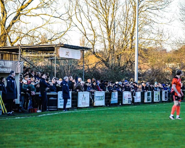 Fans packed into the On-Site Group Stadium on Bank Holiday Monday to create a new Wessex League attendance record for AFC Portchester's derby win against Fareham. Picture by Daniel Haswell.