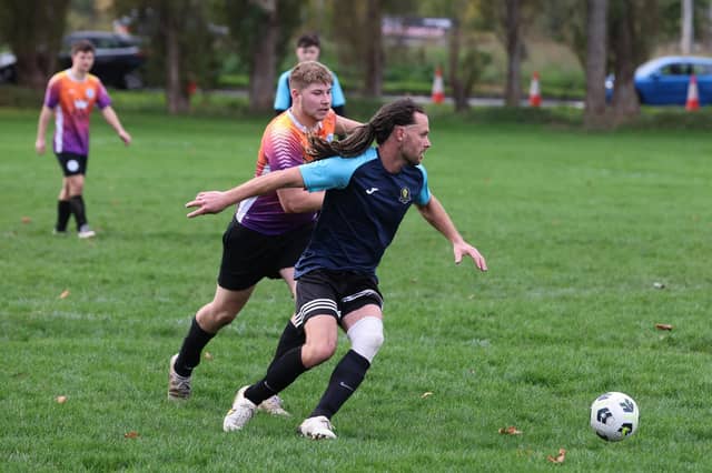 Fundraising (blue) v King George Rovers. Picture: Sam Stephenson.
