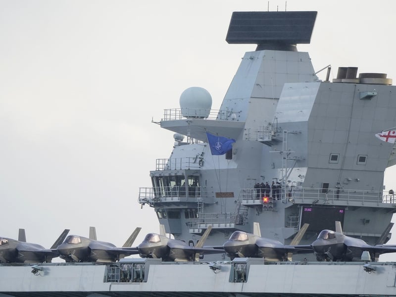 F35b jets line the deck of HMS Queen Elizabeth, as the Royal Navy aircraft carrier leaves Portsmouth Harbour. Picture date: Friday November 3, 2023. PA Photo. Photo credit should read: Andrew Matthews/PA Wire