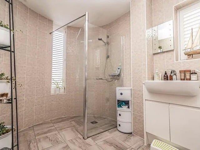 The listing says "The ground floor provides an integral double garage, providing ample space for parking and storage."
