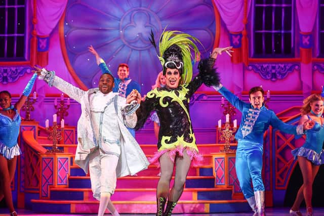 Daniel Norford as Dandini and Craig Revel Horwood as The Wicked Stepmother. Picture by Stuart Martin/Mayflower Theatre