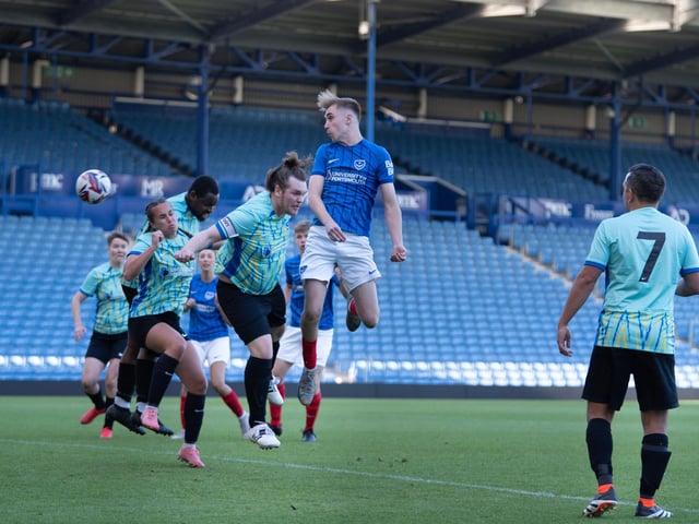 Staff and student players at Fratton Park.