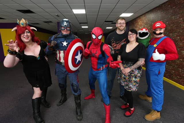 From left: Leah Blake, cosplaying as Bowsette, Gary Curtis, cosplaying as Captain America, James Price, cosplaying as Spider-man, co-owners Max Cooke and Beth Davis, and Tomas Deane, cosplaying as Super Mario. Picture: Chris Moorhouse (jpns 220621-09)