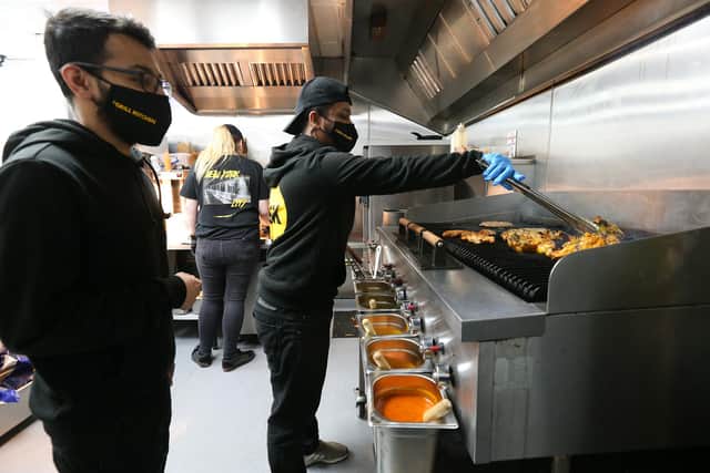 Manager Anhar Uddin, left, at The Grill Kitchen, Fratton Rd, Portsmouth
Picture: Chris Moorhouse      (230321-30)