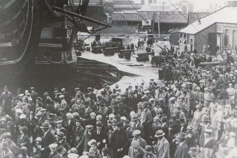 Crowds around the bows of HMS Victory at Navy Days, probably 1928.