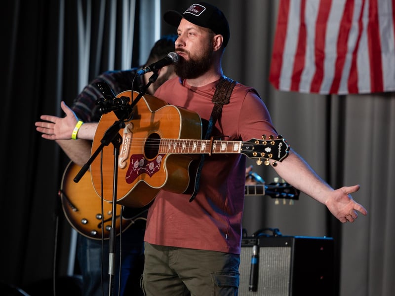 Nick Edwards and band perform on the main stage at Country On The Coast Festival 2024 in Portsmouth.