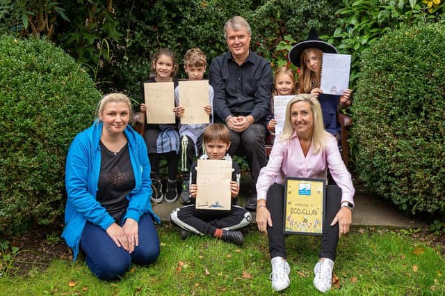 Children at the Final Straw event with letters expressing their concern for the environment. Pictured, back row: Indie Russell (7), Noah Scanlon (7), Councillor Sean Woodward (Leader Fareham Borough Council), Amelie Flavel (5) and Lilly Marsh (9). Front row: Organiser Zoe Bentley (40), Oscar King (7) and Councillor Joanne Bull (45, Sarisbury Ward). Picture: Mike Cooter (281021)