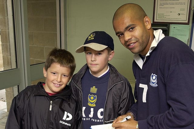 Kevin Harper signs autographs for these two young Pompey fans at the Blues former training ground at Eastleigh in 2000.