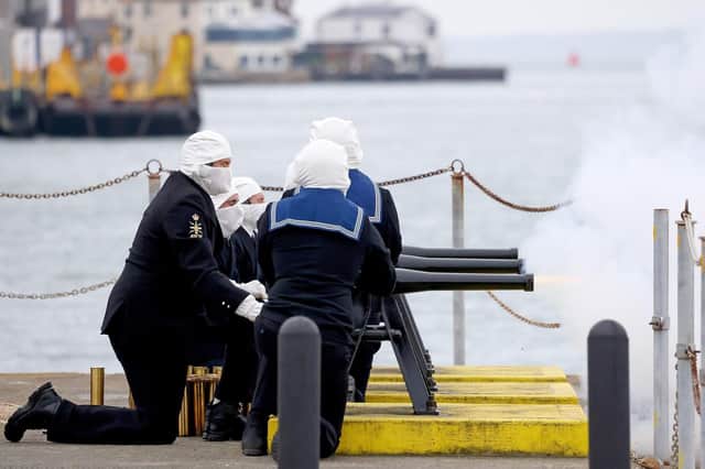 Sailors in Portsmouth performing the 41-gun salute on Saturday to mark the death of Prince Philip. Photo: Royal Navy