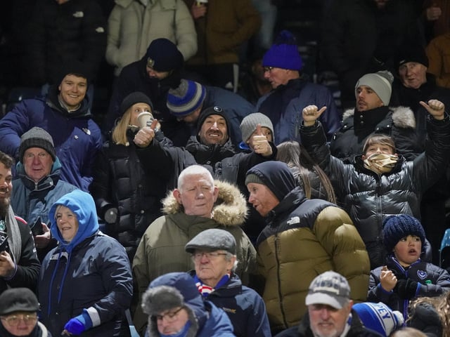 Pompey fans had to wrap up warm at Wycombe's Adams Park.