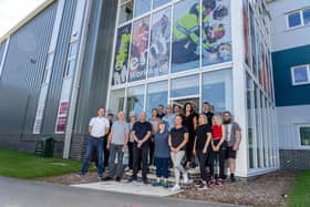 Staff members outside EMJ Workwear 10 Aug 21. Photo by Mathew Clark