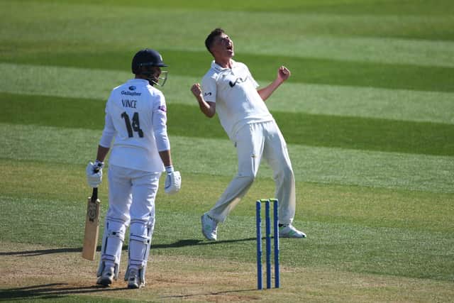 James Taylor celebrates dismissing James Vince on day three at The Oval. Photo by Jordan Mansfield/Getty Images for Surrey CCC.