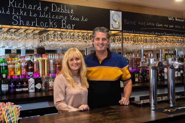 Debbie Moorhead and Richard Peckham at Sherlock's Bar last year Picture: Mike Cooter (300721)