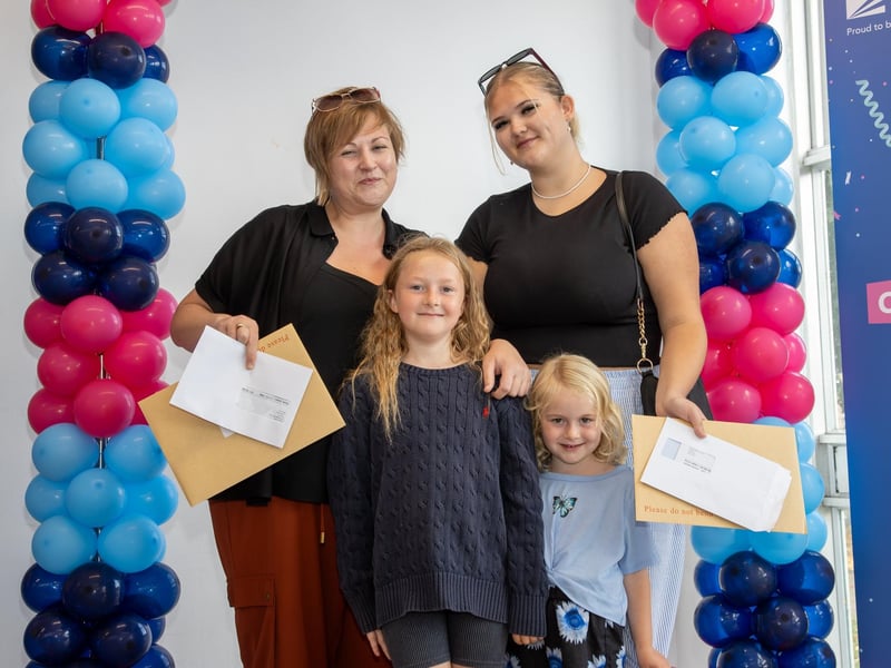 Students found out their A Level results this morning at St Vincent College as they prepare for their next steps in education.
Pictured - Mum Susan Shaw collection her Access Diploma along with daughter Millie, 17 collecting her A Level Results. Both headed to Portsmouth University to study Social Work and Child and Youth Studies with Criminology respecively. Also pictured Millies younger sisters.
Photos by Alex Shute