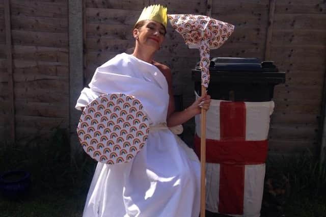Debbie Knight, 51, decorated her bin and dressed as Britannia to help celebrate the VE Day anniversary.