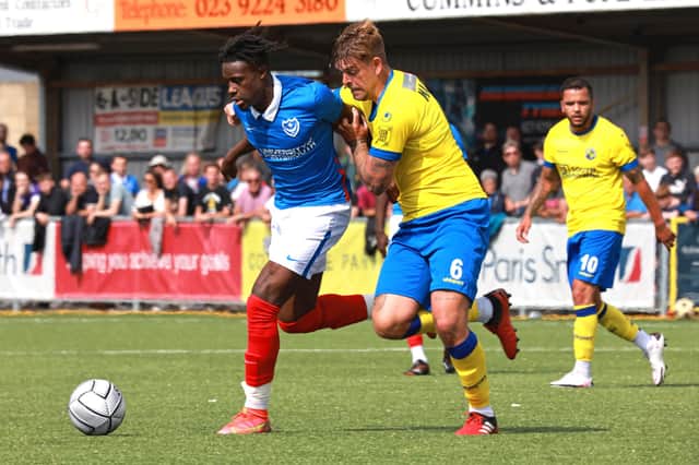 Sam Magri, right, in action for Hawks against Pompey. Picture: Paul Collins