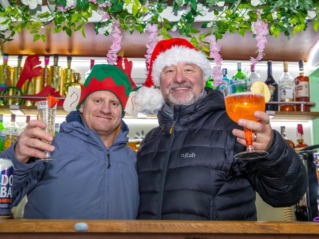 The crowds braved the wind and rain to watch the Christmas lights being switched on in Fareham highstreet on Saturday evening, while some of the entertainment was moved into the shopping centre.Pictured - Aaron Stephen & Durand Lowe of Hoggies BarPhotos by Alex Shute