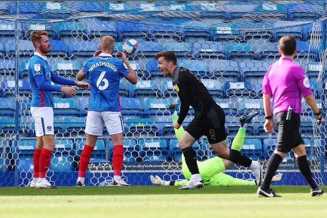 Pompey dejected after conceding in their 2-1 loss to Wigan. Picture: Joe Pepler