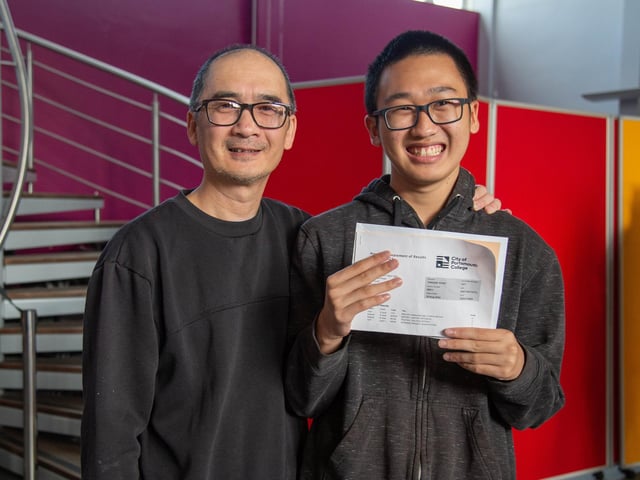 Jamie Ngo, 17, with his dad, Dzung, 53 are celebrating gaining A*s in English Literature and Language, History, and Politics, at Portsmouth College, Tangier Road
Picture: Habibur Rahman