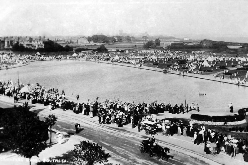 A packed Canoe Lake area in Edwardian days. It might have been a Bank Holiday perhaps. Note the carriage in South Parade.