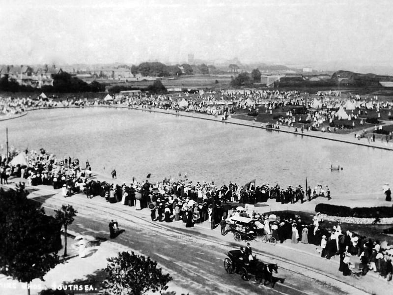 A packed Canoe Lake area in Edwardian days. It might have been a Bank Holiday perhaps. Note the carriage in South Parade.
