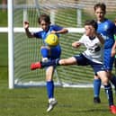 Action from Baffins Milton Rovers under-12s (blue) Portsmouth Youth League A Division encounter with Pickwick Youth Pumas under-12s. Picture Neil Marshall