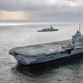 HMS Queen Elizabeth alongside HNoMS Otto Sverdrup during her Carrier Strike Group exercises off the coast of Norway. Picture: LPhot Belinda Alker.