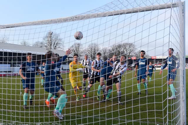 Connor Hall scores Chorley's opening goal against Derby County at Victory Park. Photo by Gareth Copley/Getty Images.