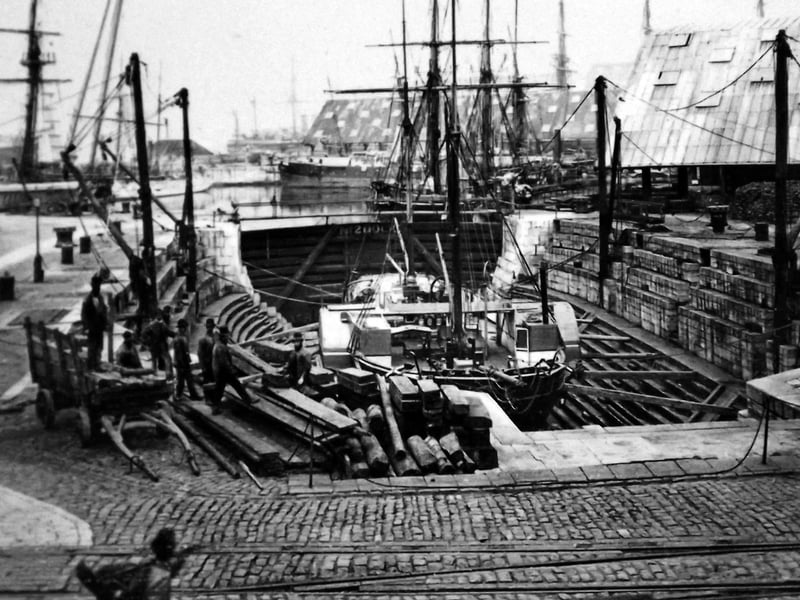Paddle tug in No.2 dry dock Portsmouth dockyard. Picture: Barry Cox postcard collection.