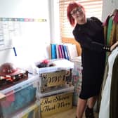 Rachel Goodall, from Milton, aims to bring some fun back into care homes with her boxes full of activities. Pictured: Rachel with some of the costumes and boxes
