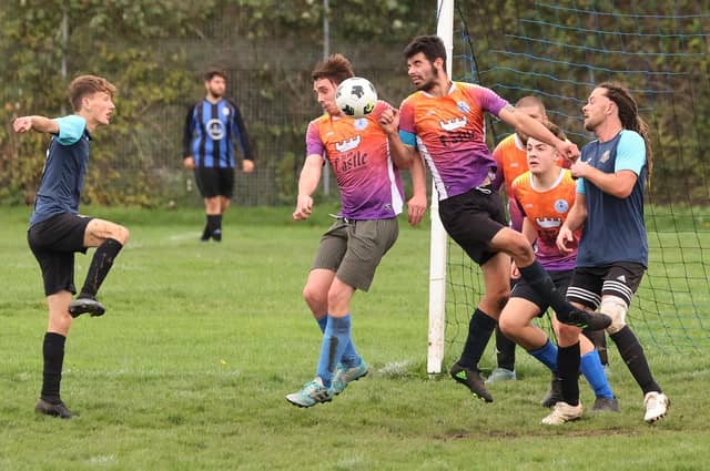 Fundraising (blue) v King George Rovers. Picture by Kevin Shipp