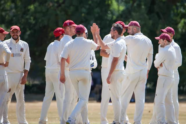 Fareham & Crofton celebrate the dismissal of Portsmouth's Matt Shaw. Picture by Alex Shute.