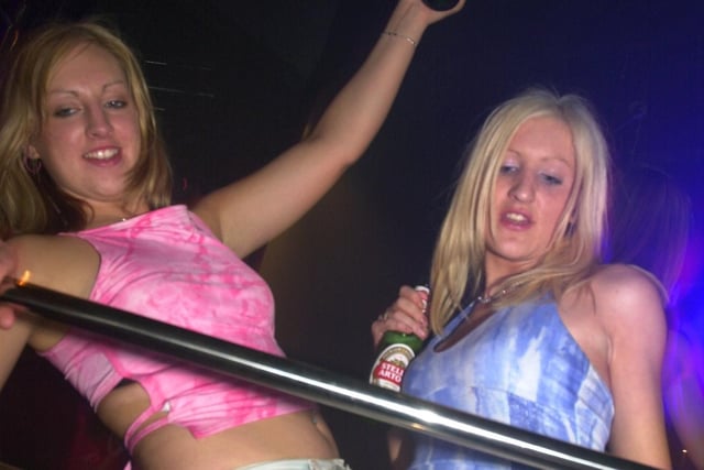 Holly Bryce, right, and Tracy Blackburn, podium dancing in Squires nightclub in Preston