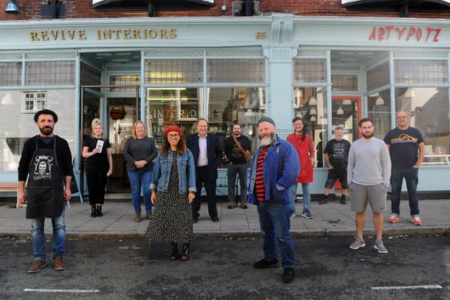 A section of Castle Road in Southsea, has been pedestrianised to allow for social distancing. Many traders are happy with the atmosphere this has created and believe it is a safer, better shopping experience for customers as a result.Pictured is: (front middle) Pete Codling with Castle Road traders.Picture: Sarah Standing (011020-4741)