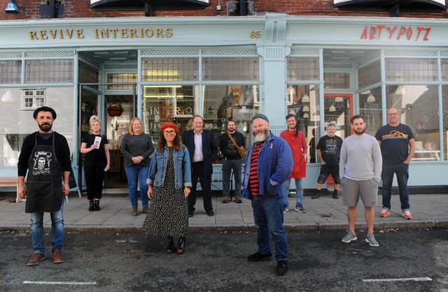 A section of Castle Road in Southsea, has been pedestrianised to allow for social distancing. Many traders are happy with the atmosphere this has created and believe it is a safer, better shopping experience for customers as a result.
Pictured is: (front middle) Pete Codling with Castle Road traders.
Picture: Sarah Standing (011020-4741)
