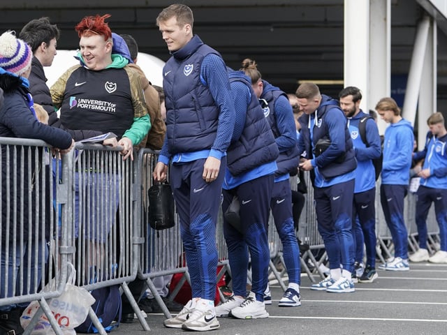 Sean Raggett makes this fan's day by posing for a selfie before entering Fratton Park