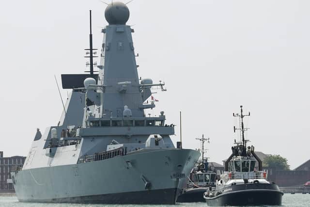 HMS Duncan arriving back in Portsmouth after being away at sea for about six months