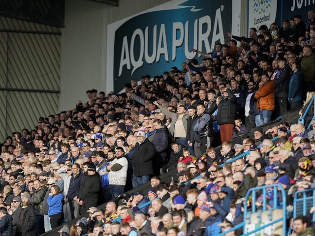 It's a 14-hour round trip between Portsmouth and Carlisle - but these fans don't care!