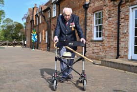 British World War II veteran Captain Tom Moore. (Photo by Justin TALLIS / AFP) (Photo by JUSTIN TALLIS/AFP via Getty Images)