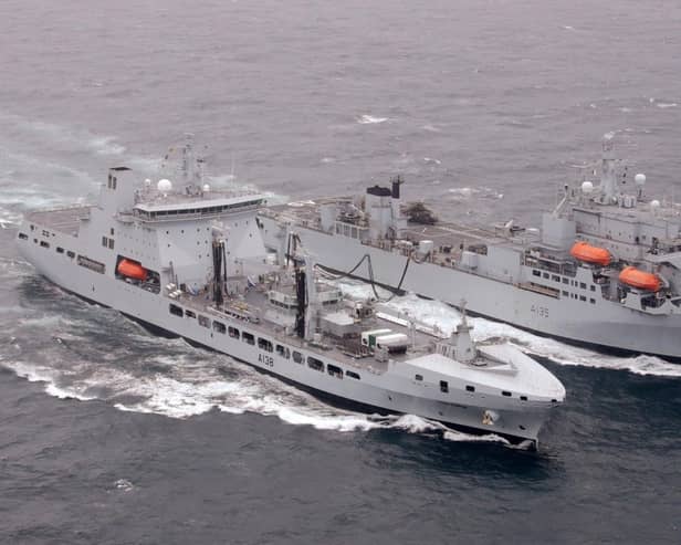 Royal Fleet Auxiliary officers are voting for industrial action across the UK. Picture is RFA Tidesurge (left), carrying out a replenishment at sea with another RFA vessel, RFA Argus. Picture: Crown Copyright/PA Wire 